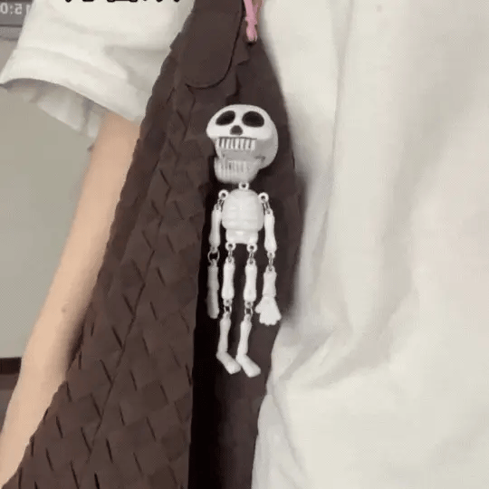 Skelvix™ – Hanging Skeleton Keychain With Movable Body Design